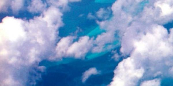 Image of clouds over blue ocean by NOAA