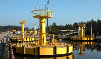 Photo of three moored buoys awaiting deployment